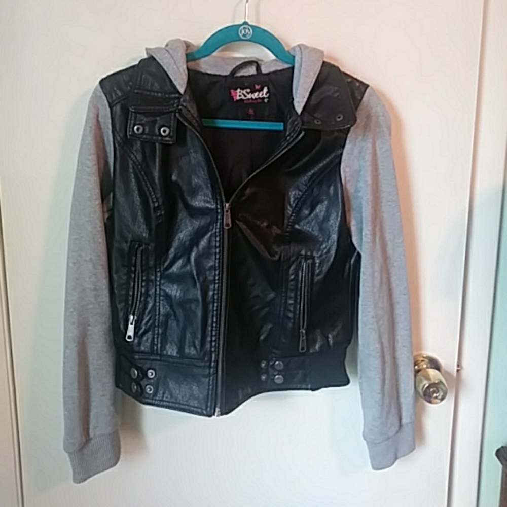 A faux leather jacket; cloth sleves and hood